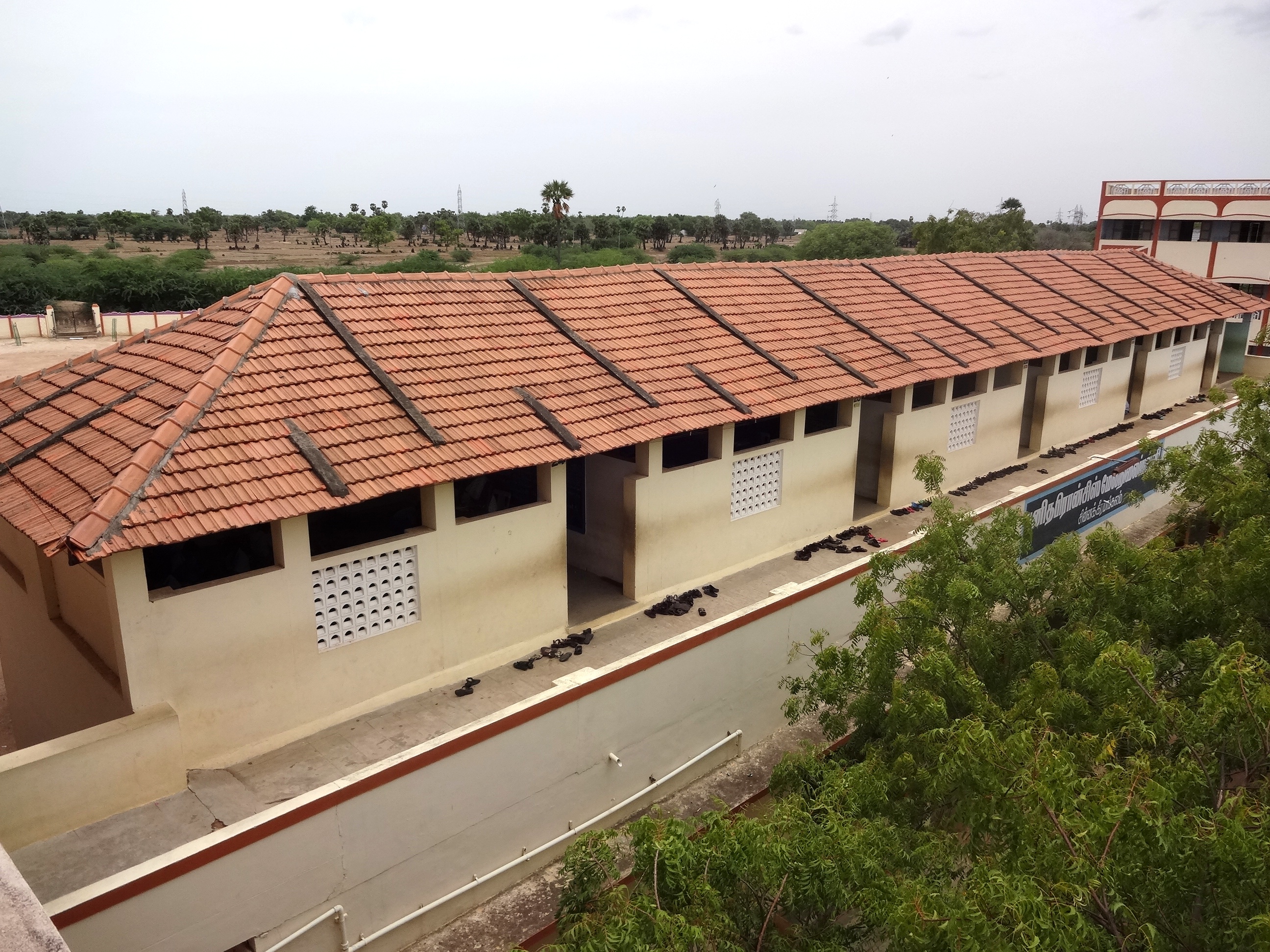 Tiled Shed Above the Dilapidated lab Fundación Esperanza y Alegría